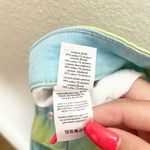 We Wore What  Tie Dye Green And Blue High Rise Raw Hem Flare Bell Shorts Photo 12