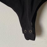 NWOT black deep v neck bodysuit Photo 2