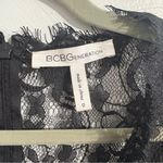 BCBGeneration BCBG Generation Black Lace Cap Sleeve Cocktail Dress Lined Pleated Skirt Size 0 Photo 2
