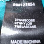 Voodoo Vixen Teal Dress with White Details Photo 6