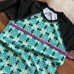 Title Nine  Rash Guard Side Scrunch Tie Black and Blue Two Sided Geometric Shapes Photo 6