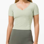 Lululemon Nulu Cropped Slim Yoga Short Sleeve | Green Fern Photo 0