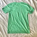 light kelly green and white Notre Dame shirt Photo 3