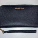 Michael Kors Jet Set Zip Around Phone Holder Wallet Wristlet Black Preloved Photo 0