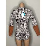 Free People New. WET brown zebra surf suit. Retails $198 Photo 1