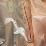 Saucony  Light Pink Women's running jacket Photo 4