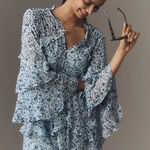 Anthropologie  Ruffle Swing Floral Romper Photo 0