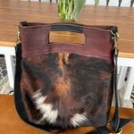 Stone Feather Road Custom Cowhide LeatherāBantam Bag Photo 1