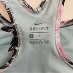 Nike  Sports Bra Dri Fit Racerback Floral Logo Athletic Blue Pink White Black Photo 7