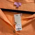 Francesca's Francesca’s orange button up top Photo 1