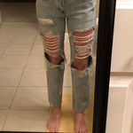 PacSun Lightwash distressed mom jeans Photo 0