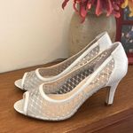 Silver open toe shoes. Size 8.5 Photo 1