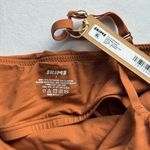 SKIMS  Fits Everybody Cropped Cami in Bronze, size small Photo 2