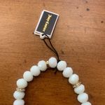 Juicy Couture  Stretch White Beaded Charm Bracelet with Teal/Turquoise Charm Photo 3