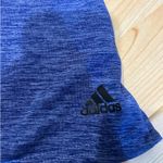 Under Armour This is a purple tank from under armor perfect for the summer and paired with good running shorts super cute and light.  Photo 1