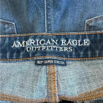 American Eagle  dark wash high rise shortie blue jean shorts in size 10 Photo 2