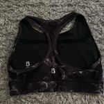 Buffbunny  marble and mesh black sport bra size small Photo 1