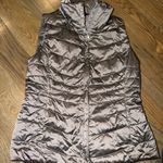 The North Face  Metallic Gray Puffer Vest sz small Photo 0