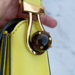 Valentino Garavani Valentino women’s pierced stud small yellow leather shoulder bag Photo 9