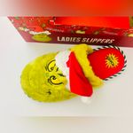 The grinch women’s slippers size 7/8 fits med size in the box Photo 1