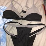 Gray And Black Bathing Suit Multiple Photo 0