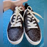 Calvin Klein Sz 9.5 low top Michaela 2 Fashion Signature CK Print Sneakers Brown Photo 2