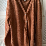 Cozy Brown Button Photo 0