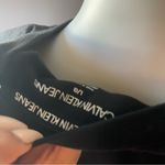 Calvin Klein  dress size Large 
In great condition 
Stretchy 
Logo on both sides Photo 6