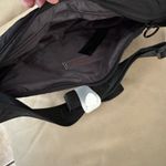 Free People  Bulls Eye Sling Bag. Color black. MSRP $40  Photo 11