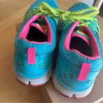 Nike women’s Flex Trail 2 sneakers size 9 turquoise and pink Photo 4