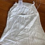 Endless Rose shimmery white tank top Photo 1