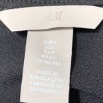 H&M Black Short Sleeve Blouse Women’s Size S Boat Neck Stretchy Polyester Top Photo 4