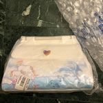 Lounge Fly Lisa Frank Crossbody Photo 1