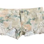 Mossimo Supply Co floral low rise jean shorts Photo 0