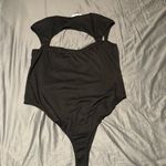 Princess Polly  Black Bodysuit with Cut-Out Design Photo 1