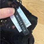 White Fox Boutique  - Lace Up Back Halter Neck Sheer Lace Romper in Black Photo 5