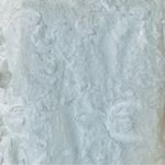 Arula White Floral Peplum Rosette Textured Sleeveless Smocked Cropped Blouse. Size 1X Photo 2