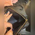 Coach Black Leather wristlet. Photo 4