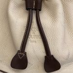 Dooney & Bourke DOONEY BOURKE Vintage Cream and Brown Leather Trim Bucket Bag Photo 2