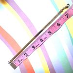 Gold tone flat herringbone bracelet Photo 3