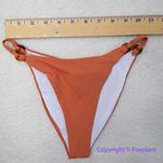 NEW Rhythm Free People Ring Itsy Bikini Bottoms, size L‎ Orange Size L Photo 4