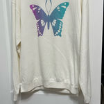 Urban Outfitters  Cream Top with Blue Butterfly Photo 0