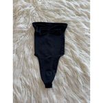 SKIMS Seamless Sculpt Strapless Thong Bodysuit Onyx
Size Small Photo 1