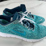 Nike  Women's Turquoise Athletic Shoes Photo 0