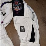 Helly Hansen  White Ski & Snow Jacket with Purple and Blue Accents Photo 4