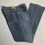 Mid Rise Bootcut Jeans Photo 1