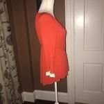Entro  Orange & White Shirt Is M but fits … Photo 1