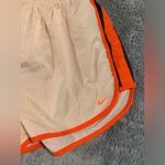Nike medium orange striped shorts Photo 1