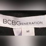 BCBGeneration  dress - silky black pink blue tan - size medium. Never worn. Photo 5