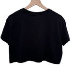 Nike Women’s black Just Do It graphic logo cropped t shirt size medium Photo 3